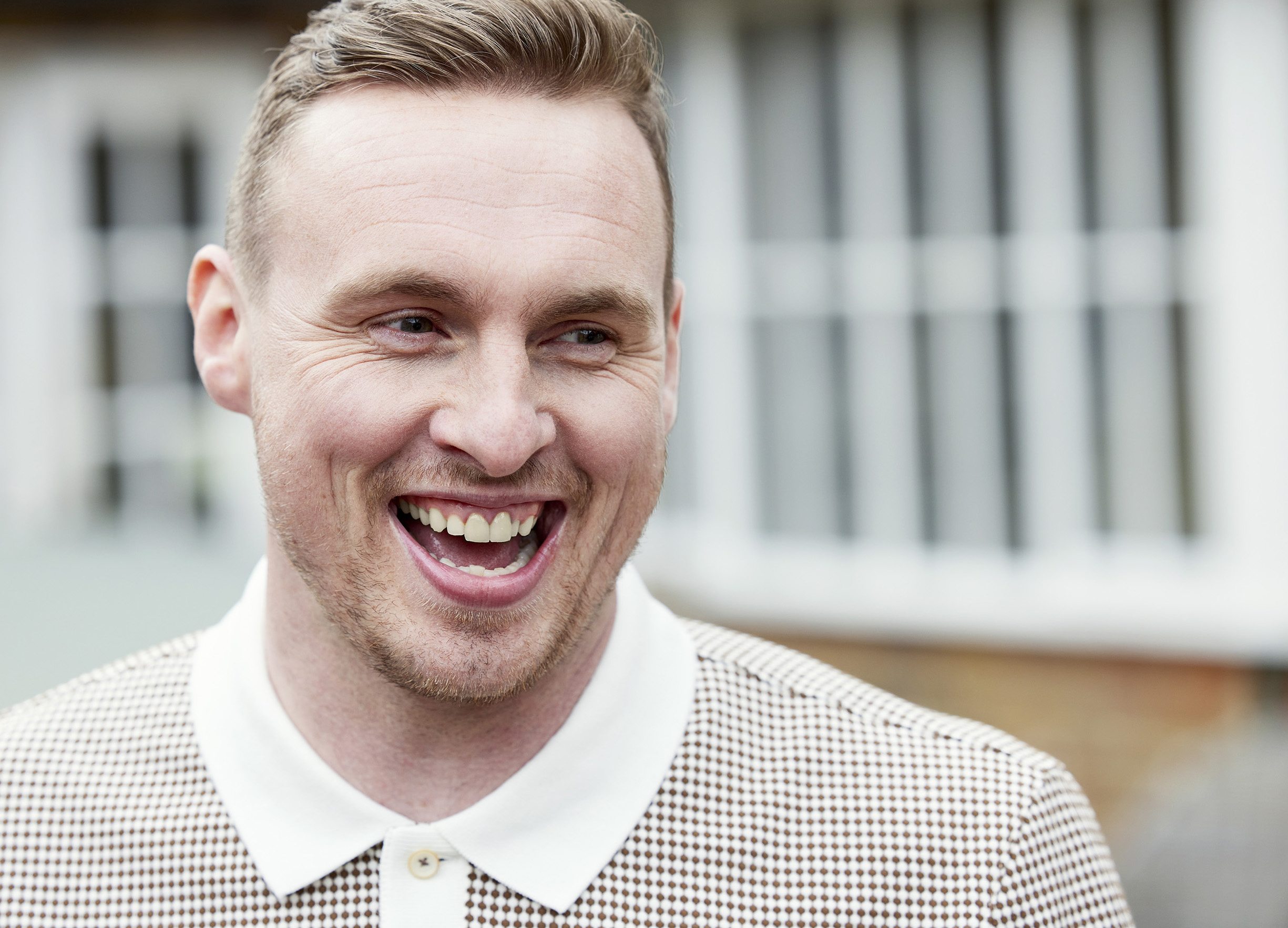 A close up of David Stockdale laughing